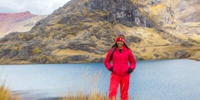 Our passenger is very happy next to Lake Pucacocha on the Ausangate trek