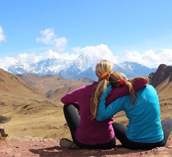 Abra Kuychiccasaour clients happy in the ancascocha trek 5 days next to snowy mountains