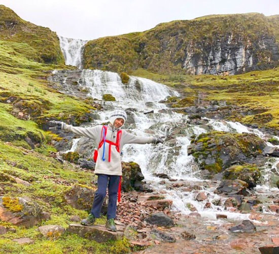 the waterfalls of lares with beautiful crystalline waters with a child