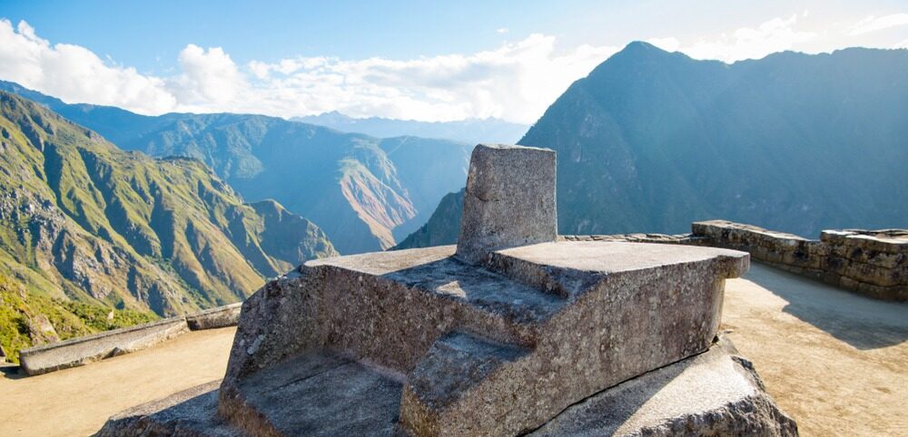 The Intihuatana Stone at Machu Picchu on a beautiful day