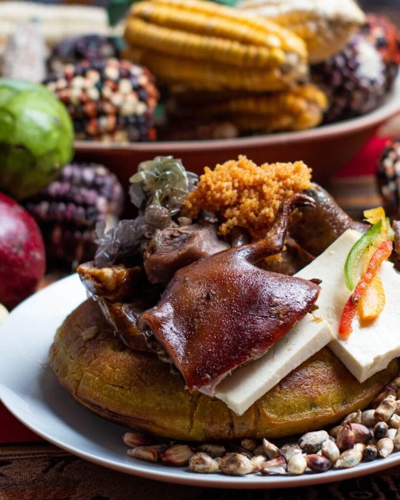 Tourist eating the typical dish of Cusco, the Chiriucho.