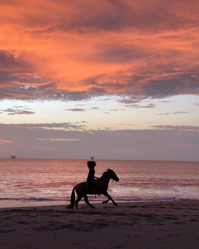 Horseback riding on the beach