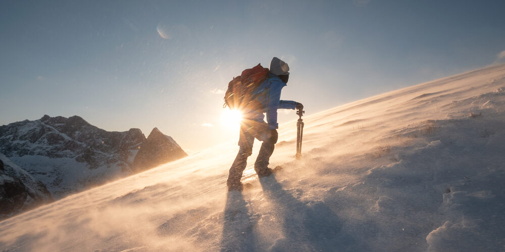 Climbing on snowy Jampa at dawn