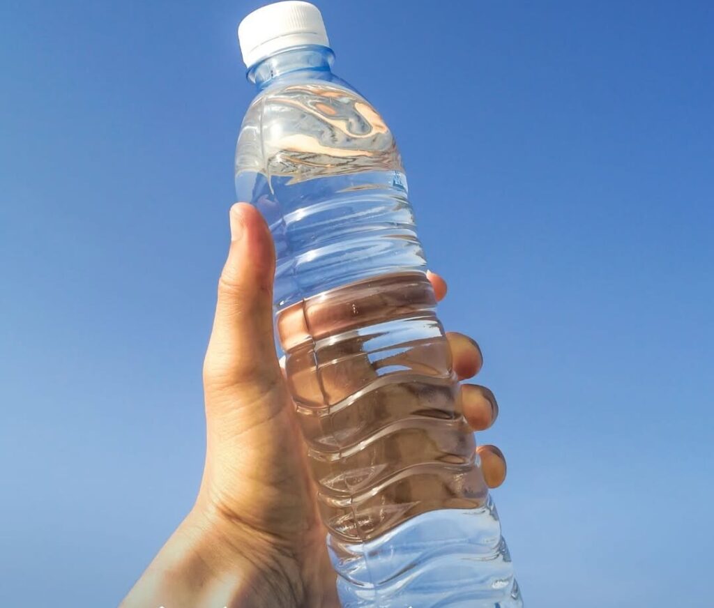 The Best Foods to Eat While Hiking: Fuel Your Adventure 16 Tourist drinking water