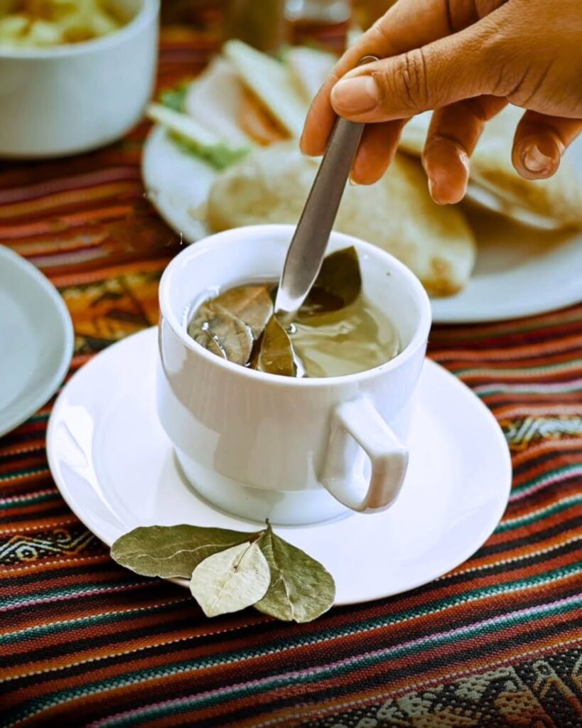 Best Cusco Tour Options for Acclimatization Before a Trek 15 A tourist drinking coca tea